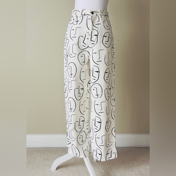 Shekou Pants - Shekou "Little Things" white denim jeans with a black abstract face print EUC